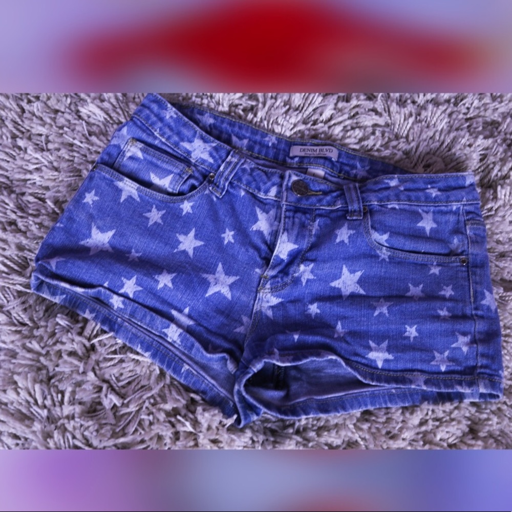 White starred light blue denim shorts. American